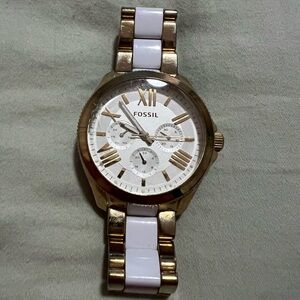 Women’s white and gold fossil watch